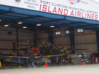 P-51 Mustang and B-25 Mitchell Bomber inside the hangar